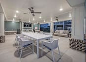 Thumbnail 67 of 74 - A patio with a table at Waterleaf at Neely Ferry Apartments, Simpsonville, SC