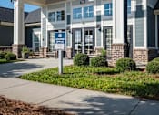 Thumbnail 55 of 74 - A building with a sign at Waterleaf at Neely Ferry Apartments, Simpsonville, South Carolina