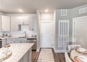 Thumbnail 5 of 38 - Gourmet Kitchen at Prosper Madison Oaks, Madison