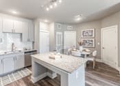 Thumbnail 3 of 38 - Open Kitchen at Prosper Madison Oaks, Madison, AL, 35758