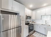 Thumbnail 6 of 38 - Modern Kitchen at Prosper Madison Oaks, Madison, AL