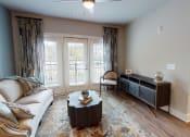 Thumbnail 27 of 32 - Living room decor at Bellary Flats Apartments, Summerville , 29486