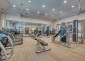 Thumbnail 1 of 39 - the gym in the clubhouse is equipped with cardio equipment and weights at Citadel at Westpointe, San Antonio, TX, 78251