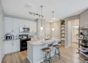 Thumbnail 5 of 39 - Living and kitchen at Citadel at Westpointe, Texas, 78251