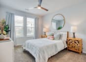 Thumbnail 10 of 15 - a bedroom with a bed and a mirror  at Edge and Stone, San Antonio