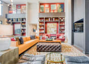 Thumbnail 3 of 15 - a living room filled with furniture and a book shelf  at Edge and Stone, San Antonio, 78260
