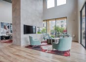 Thumbnail 4 of 15 - a living room with a couch and chairs and a tv  at Edge and Stone, Texas, 78260