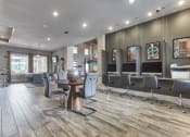 Thumbnail 5 of 18 - a barbershop with chairs and mirrors in a salon at Legacy Flats, San Antonio Texas