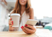 Thumbnail 18 of 18 - a woman holding a cup of coffee and a cell phone at Legacy Flats, Texas