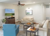 Thumbnail 35 of 35 - a living room with couches and chairs and a tv