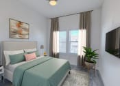 Thumbnail 3 of 14 - a bedroom with a bed and a window