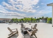 Thumbnail 5 of 23 - the preserve at ballantyne commons terrace patio with chairs and fire pit
