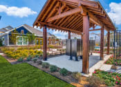Thumbnail 20 of 20 - a gazebo with a hot tub in a garden