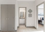 Thumbnail 11 of 15 - A grey double door is on the left of the image.
