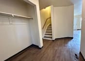 Thumbnail 3 of 14 - an empty room with a staircase and a white wall