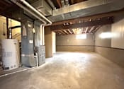 Thumbnail 14 of 14 - a large room with a concrete floor and pipes in it