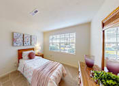 Thumbnail 9 of 11 - a bedroom with a large walk-in closet