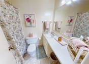 Thumbnail 8 of 11 - a bathroom with a built-in vanity
