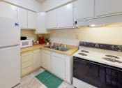 Thumbnail 2 of 11 - a full-size kitchen with a refrigerator