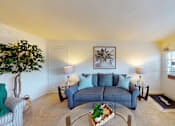 Thumbnail 7 of 15 - a living room with wall to wall carpet