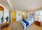 Thumbnail 18 of 21 - a master suite with a full bath and walk-in closet