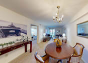 Thumbnail 11 of 21 - a separate dining space with a chandelier