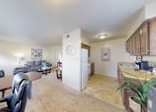 Thumbnail 5 of 17 - a carpeted dining space and tiled kitchen