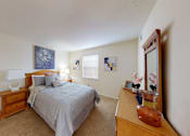 Thumbnail 12 of 17 - a bedroom with a window and walk-in closet