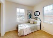 Thumbnail 15 of 17 - a bedroom with windows and a walk-in closets
