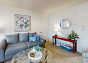 Thumbnail 4 of 17 - a living room with wall-to-wall carpeting
