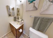 Thumbnail 16 of 19 - a bathroom with tiled flooring
