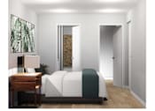 Thumbnail 15 of 22 - a bedroom with a bed and a desk