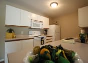 Thumbnail 20 of 75 - This is a photo of the kitchen in the 1040 square foot 2 bedroom Patriot at Washington Place Apartments in Washington Township, OH.