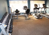 Thumbnail 24 of 34 - This is a photo of the fitness center at The Summit at Midtown in Dallas, TX.