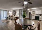 Thumbnail 40 of 65 - A modern dining room with a round table and chairs in a 1 bedroom, 1 bath 560 square foot apartment at Aspen Village Apartments in the Westwood neighborhood of Cincinnati, OH.