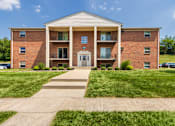 Thumbnail 63 of 65 - Brick apartment building with secure entry and sidewalk at Aspen Village on the west side of Cincinnati