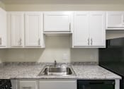 Thumbnail 9 of 56 - This is a photo of the kitchen in the 543 square foot B-style, 1 bedroom, 1 bath apartment at Blue Grass Manor Apartments in Erlanger, KY.