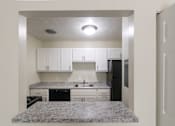 Thumbnail 7 of 56 - This is a photo of the kitchen pass through window in the 543 square foot A-style, 1 bedroom, 1 bath apartment at Blue Grass Manor Apartments in Erlanger, KY.