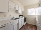 Thumbnail 1 of 56 - This is a photo of the kitchen in the 899 square foot, 2 bedroom, 1.5 bath apartment at Blue Grass Manor Apartments in Erlanger, KY.
