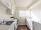 Thumbnail 2 of 56 - This is a photo of the kitchen in the 899 square foot, 2 bedroom, 1.5 bath apartment at Blue Grass Manor Apartments in Erlanger, KY.