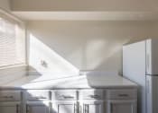 Thumbnail 3 of 56 - This is a photo of the kitchen in the 899 square foot, 2 bedroom, 1.5 bath apartment at Blue Grass Manor Apartments in Erlanger, KY.