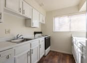 Thumbnail 30 of 56 - This is a photo of the kitchen in the 899 square foot, 2 bedroom, 1.5 bath apartment at Blue Grass Manor Apartments in Erlanger, KY.
