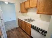Thumbnail 24 of 56 - This is a photo of the kitchen in the 652 square foot, 1 bedroom, 1 bath A-style apartment at Blue Grass Manor Apartments in Erlanger, KY.