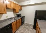 Thumbnail 20 of 56 - This is a photo of the kitchen of the 902 square foot, 2 bedroom, 1 and a half bath apartment at Blue Grass Manor Apartments in Erlanger, KY.