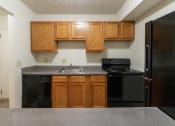 Thumbnail 21 of 56 - This is a photo of the kitchen of the 902 square foot, 2 bedroom, 1 and a half bath apartment at Blue Grass Manor Apartments in Erlanger, KY.