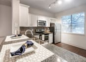 Thumbnail 5 of 52 - Kitchen Countertop at The Brownstones, Texas