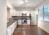 Thumbnail 4 of 52 - Large Kitchen at The Brownstones, Texas, 75240
