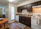Thumbnail 35 of 62 - Kitchen With Custom Cabinetry at The Biltmore, Texas, 75231