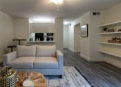 Thumbnail 12 of 42 - This is a photo of the living room in a 692 square foot 1 bed, 1 bath model aprtment at Cambridge Court Apartments in Dallas Texas