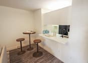 Thumbnail 9 of 42 - Photo of the dining area in a 692 square foot 1 bed, 1 bath model aprtment at Cambridge Court Apartments in Dallas Texas